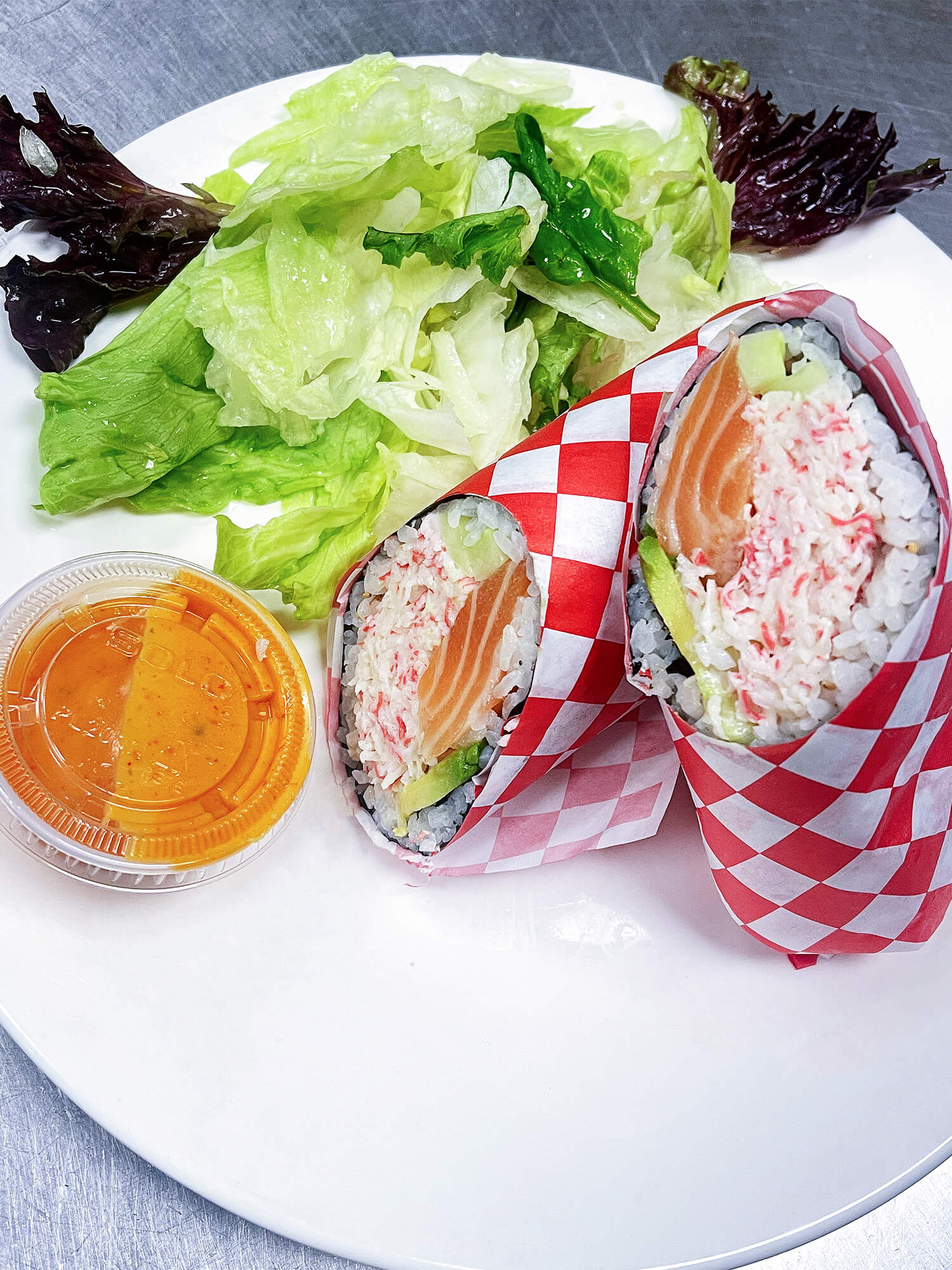 Aloha-Hawaiian-BBQ-&-Sushi-Asian-Fusion-restaurant-Salmon-Crab-Sushi-Burrito-Baldwin-Park Sushi burrito filled with salmon, crab, avocado Sushi burrito with chicken, avocado, and vegetables at Aloha Hawaiian BBQ & Sushi, a Asian Fusion restaurant in Baldwin Park
