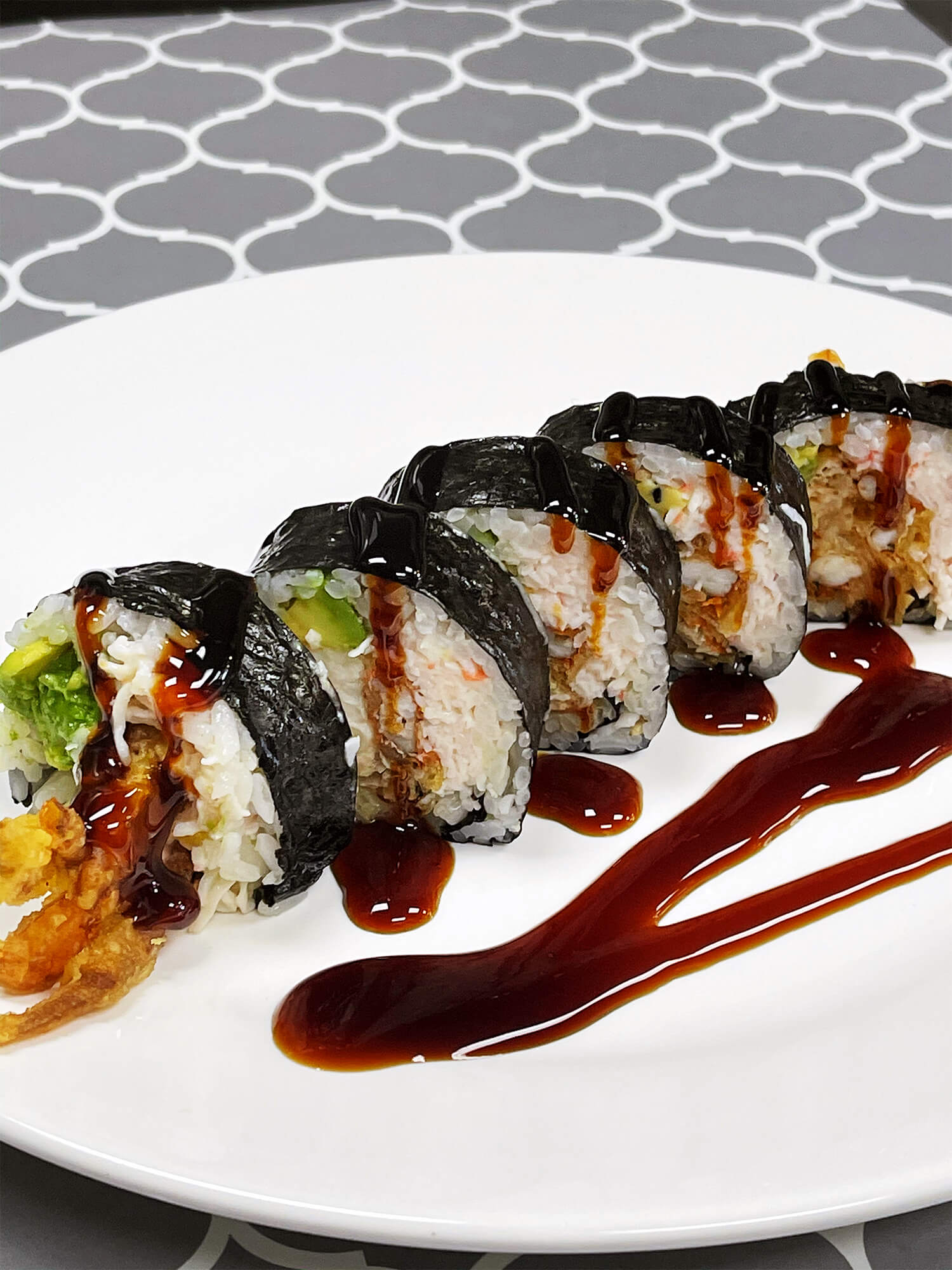 Aloha-Hawaiian-BBQ-&-Sushi-Asian-Fusion-restaurant-Tempura-Shrimp-Sushi-Roll-Baldwin-Park Sushi roll with tempura shrimp, avocado, and eel sauce drizzle at Aloha Hawaiian BBQ & Sushi, a Asian Fusion restaurant in Baldwin Park