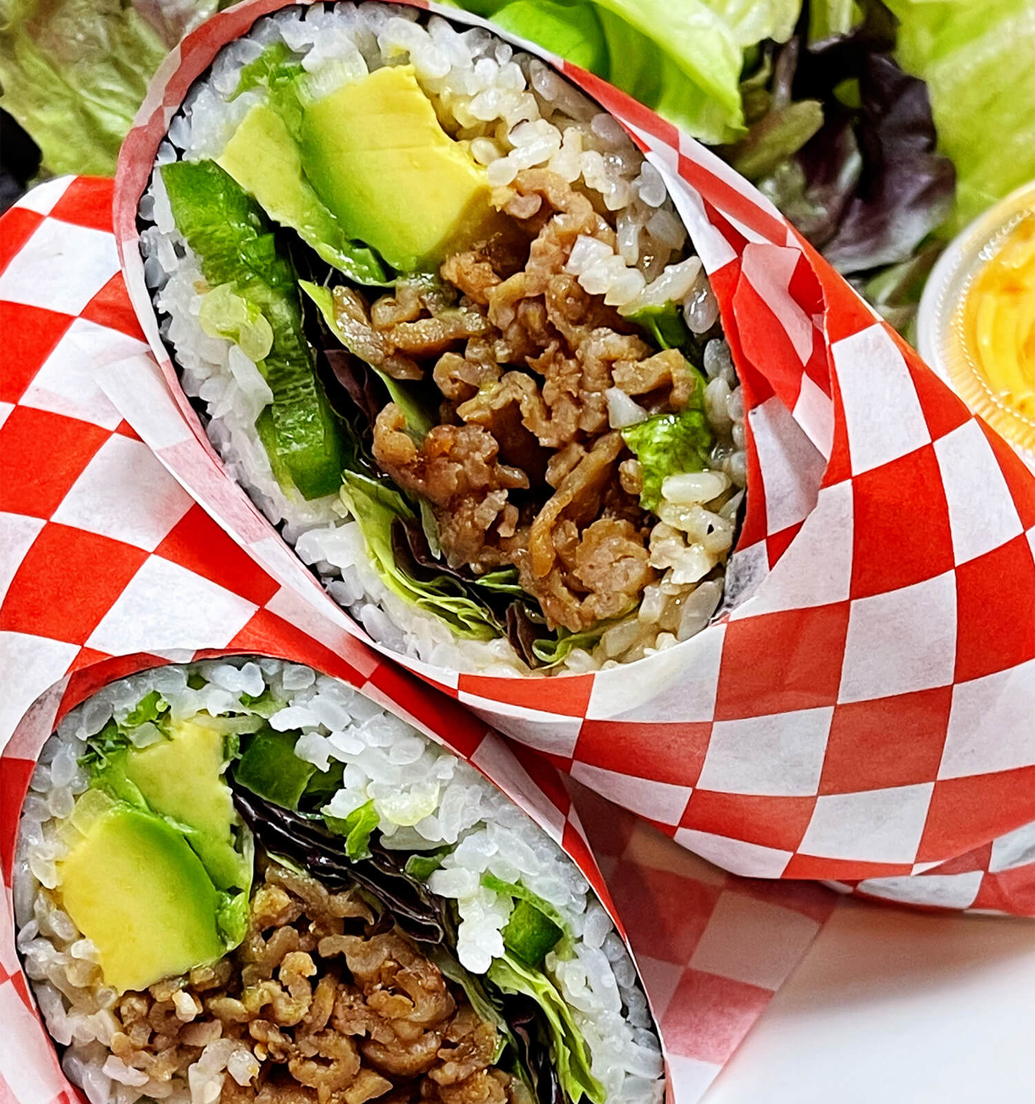 Aloha-Hawaiian-BBQ-&-Sushi-Asian-Fusion-restaurant-Beef-Avocado-Sushi-Burrito-Baldwin-Park Sushi burrito with beef, avocado, and greens at Aloha Hawaiian BBQ & Sushi, a Asian Fusion restaurant in Baldwin Park